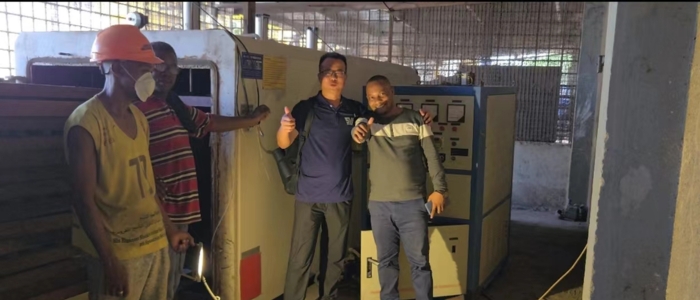 Carlos and Michael with Shuowei radio frequency wood drying machine