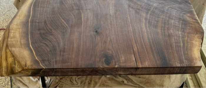 Hairline crack on live edge wood caused by improper drying